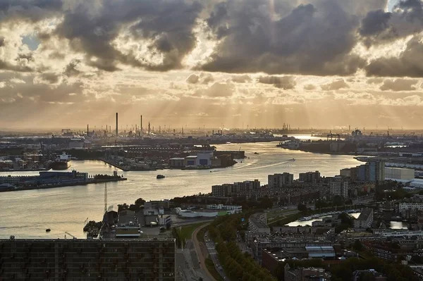 View from Rotterdam towards the port area, industrial facilities in the background