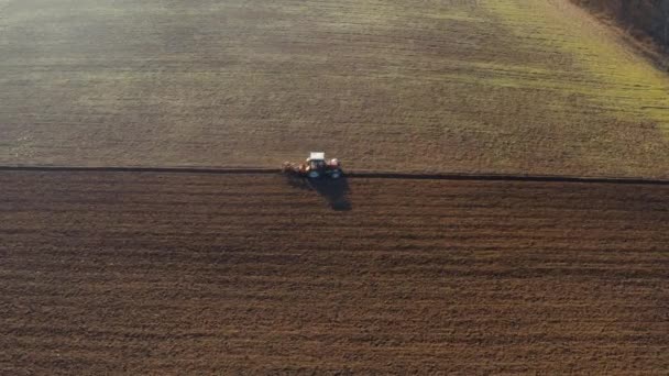 Tractor Plowing Agricultural Fields Aerialdrone View — Stockvideo