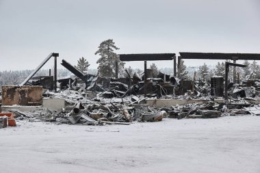 Burnt down of shopping center in Finnish Lapland. Ruins remain after the devastating fire