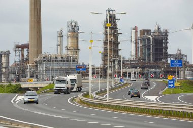 Busy main road and railway line in the Port of Rotterdam, busiest port of Europe