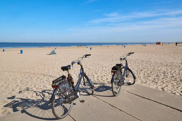 stock image Bicycles parked on a sandy beach in Hoek Van Holland, The Netherlands