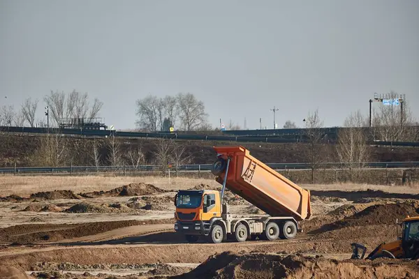 Dump truck at a road construction site work