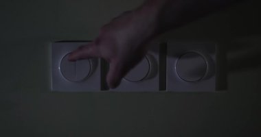 Light switches turned on in a room at night