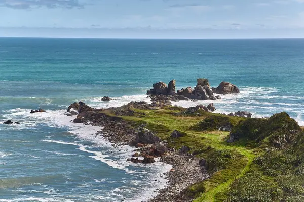 stock image Coastal landscape at Cape Foulwind in New Zealand, cliffs between the sea waves