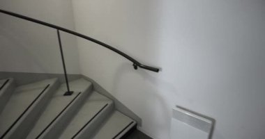 Going up on spiral staircase in a building