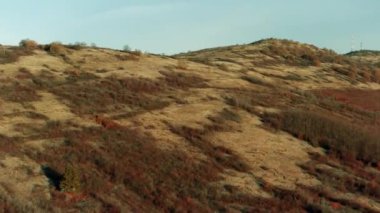 Drone aerial view landscape hills with dry vegetation wasteland
