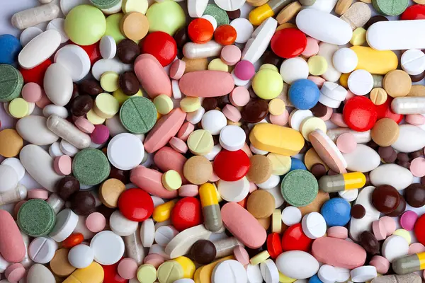 Φόντο Από Χρωματιστά Χάπια Ταμπλέτες Και Κάψουλες — Φωτογραφία Αρχείου