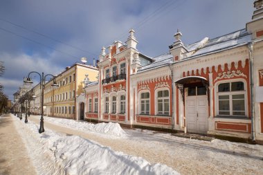 Tourist pedestrian Mayakovsky street with ancient buildings in Smolensk. The house where the sculptor Konenkov was born. clipart