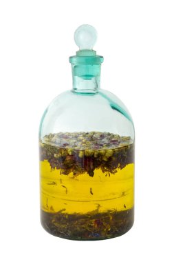 Bitkisel tentür ya da beyaz üzerine gerekli yağ şişesi. Alternatif bitkisel ilaç.