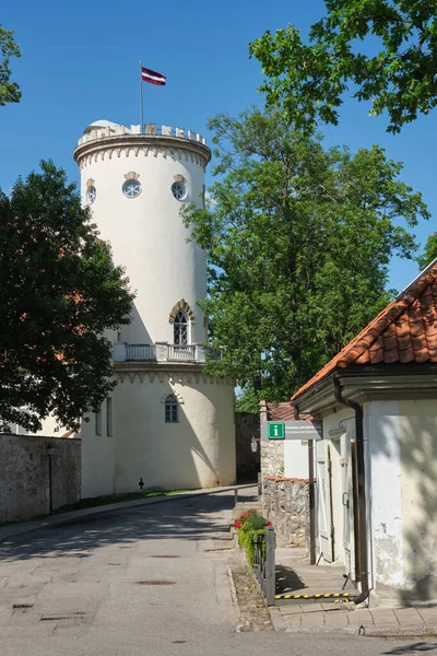 Latvian tourist landmark attraction - Tower of white castle. Part of ancient Livonian castle ruins in old town of Cesis, Latvia.