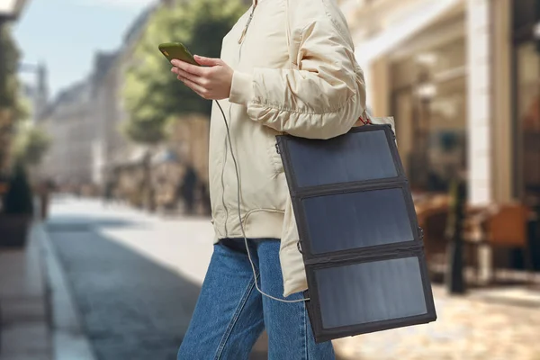 Unrecognizable Woman Flexible Solar Battery Holding Smartphone Background City Travel — Stock Photo, Image