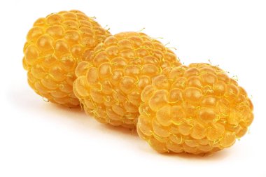 Three yellow raspberry berries isolated on white background. High resolution photo. Full depth of field.