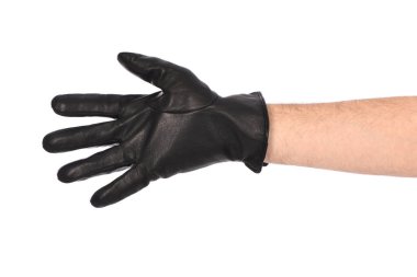 Beyaz arka planda siyah deri eldiven giyen adam, yakın plan. Yan görüş. Yüksek çözünürlüklü. Tam alan derinliği.