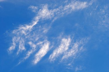 Clouds in the blue sky. Bright blue landscape in the environment daytime skyline horizon view. High resolution photo.