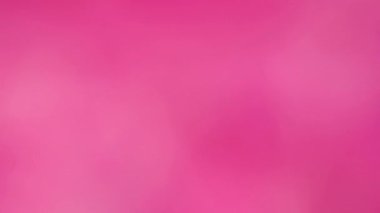 Bulanık arkaplan bulanık, soyut pembe arkaplan. Üst Manzara. Döngü hareketi. Rotasyon 360. 4K UHD video görüntüsü 3840X2160.