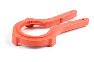 Evrensel anahtar çevirici kırmızı kavanozlar ve konserveler için vida kapakları. Yan görüş. Yüksek çözünürlüklü. Tam alan derinliği.