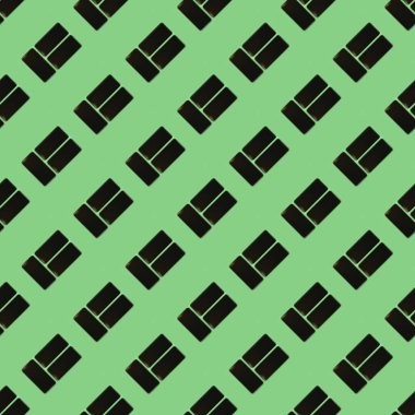 Kusursuz desen. Siyah cep telefonu ve boş ekran. Yeşil arka planda izole edilmiş. Yüksek çözünürlüklü. Tam alan derinliği.