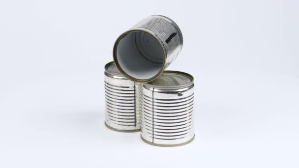 Three Metal Cans White Background Side View Loop Motion Rotation — Stock Video