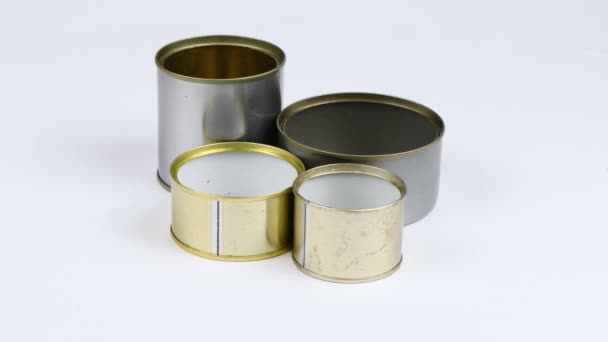 Four Metal Cans White Background Side View Loop Motion Rotation — Stock Video