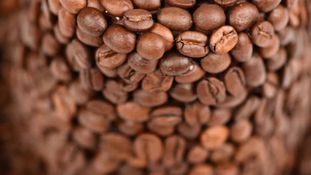 Rostade Kaffebönor Bakgrund Fokusera Förgrunden Sidovy Uhd Videofilmer 3840X2160 — Stockvideo