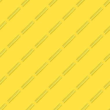 Kusursuz desen. Eczacılık ilaçları, insanların sağlığını iyileştiren ilaçlar. Sarı arka planda sarı haplar. Yüksek çözünürlüklü. Tam alan derinliği.