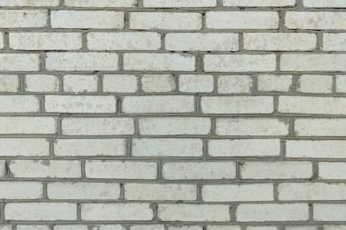 Beyaz tuğla duvar. Eski bir tuğla duvara yakın çekim.