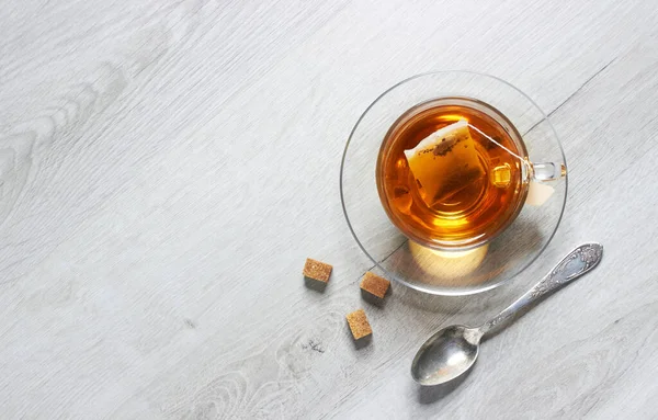 Bir Fincan Çay Çay Poşeti Kaşık Şeker Hafif Ahşap Arka — Stok fotoğraf