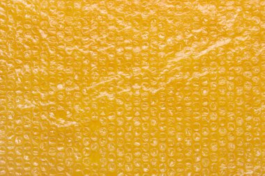 Sarı baloncuklu paket dokusu