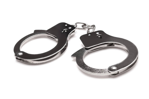 Наручники изолированы на белом фоне
