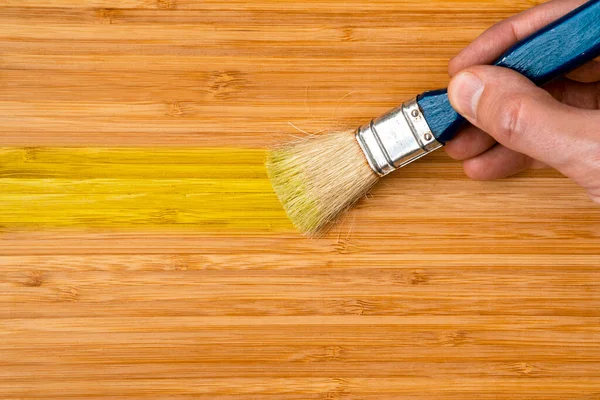 Process Painting Pine Wood Boards Brush Yellow Paint — Stock Photo, Image