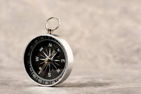 Magnetic Compass Grey Stone Background Concept Global Travel Tourism Exploration — Stock Photo, Image