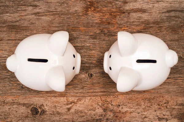 Two Piggy Banks Looking Each Other Financial Savings Concept — Stock Photo, Image