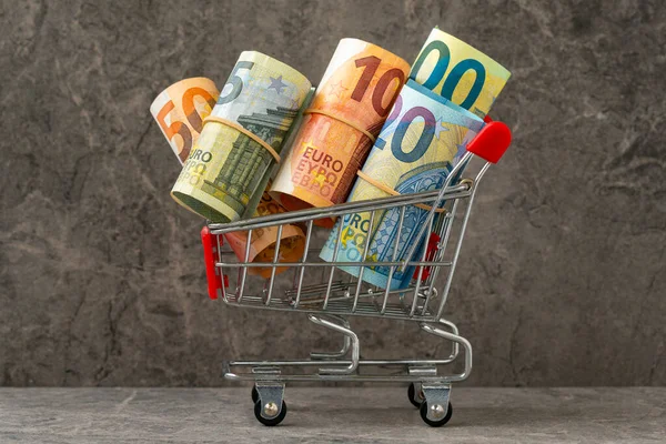 Shopping Cart Full Roll Euro Banknotes Shopping Costs Money — Stock Photo, Image