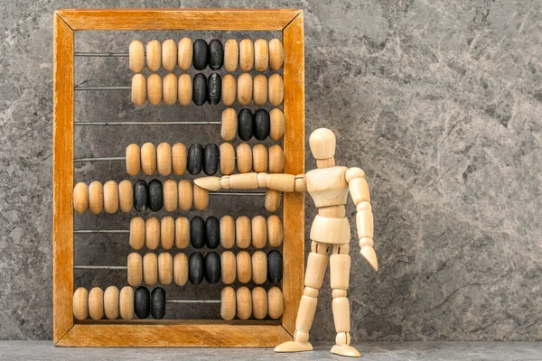 Wooden Man Counting Old Wooden Abacus Financial Concept — Stock Photo, Image