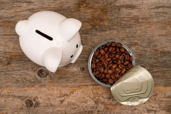 Piggy Bank Next Opened Tin Can Full Roasted Coffee Beans — Stock Photo, Image