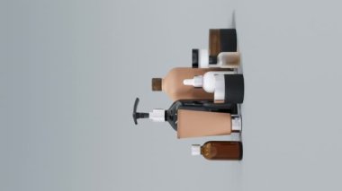 Farklı bej ve kahverengi cam ve plastik kozmetik şişeler grubu ve dikey dönen kavanozlar 3D görüntüleme, fotokopi alanı, moda cilt bakımı ve tedavisiyle paketlenmiş birçok güzellik ürünü