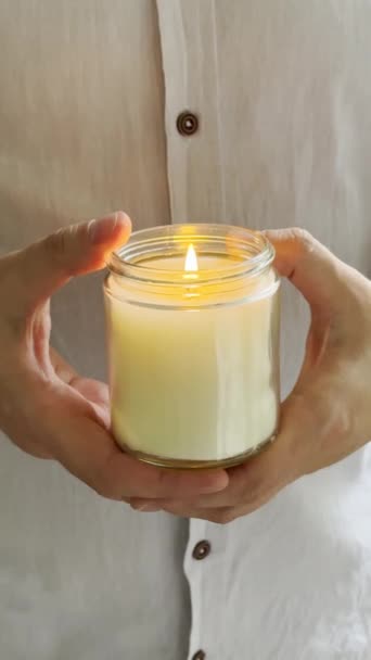 Mans Hands Holding Burning Candle Glass Jar Decorative Container Candle — Stock Video
