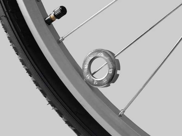 Bicycle Spoke Wrench Front Bicycle Wheel Close Isolated Light Gray — Stockfoto