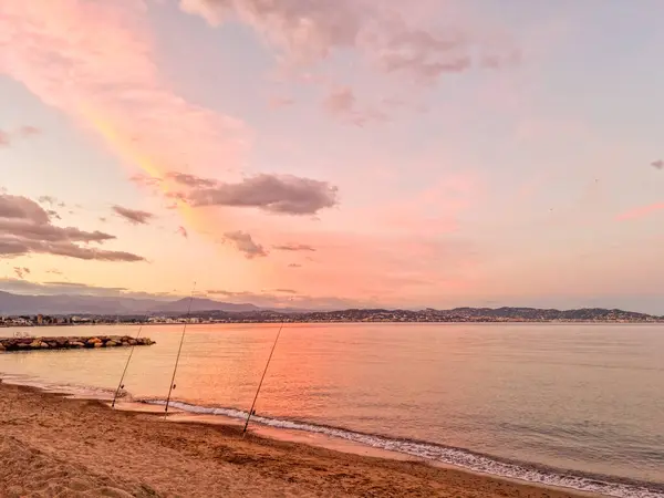 stock image Sunset on the beach in Theoule sur Mer, South of France