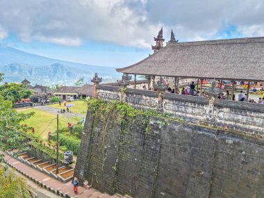 Bali, Indonesia - 16 August, 2024: People walking in the Lempuyang temple. The place is often overcrowded and people wait for hours to take pictures in the Gate of Heaven. clipart