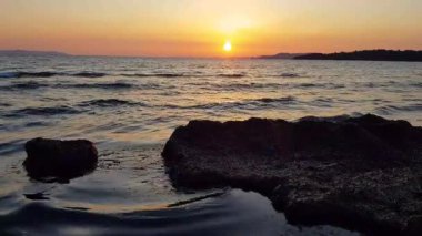 Gün batımı ve okyanus