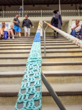 Porto, Portugal - 11 June, 2025: People walking in the Bolhao market decorated for the Festa de Sao Joao (Midsummer party). The traditional place is a neoclassic building famous for its fresh products.