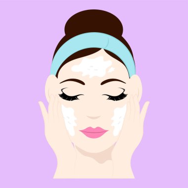 Yüzünü Pembe Arkaplanda Temizleyen Kadın.