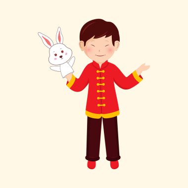 Character Of Chinese Young Boy Wearing Rabbit Puppet Glove In One Hand On Beige Background.