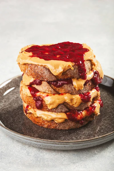 stock image peanut butter and jam sandwich, american traditional bread toast