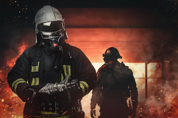 Portrait Fire Fighting Fireman Dressed Protective Suit Holding Fire Hose — Stock fotografie