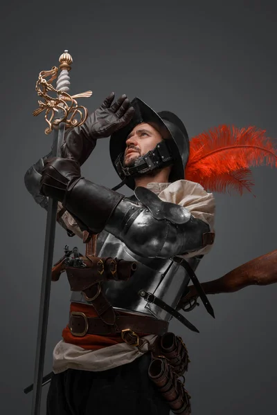 Shot Handsome Musketeer Man Dressed Plate Armor Holding Sword Looking — Fotografia de Stock