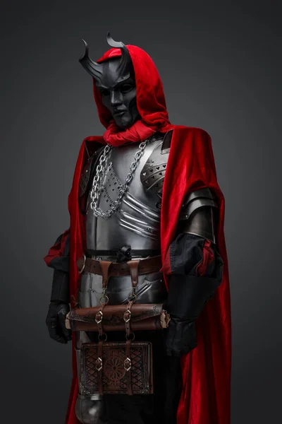 Portrait Dark Knight Red Cloak Horned Mask Isolated Grey Background — ストック写真