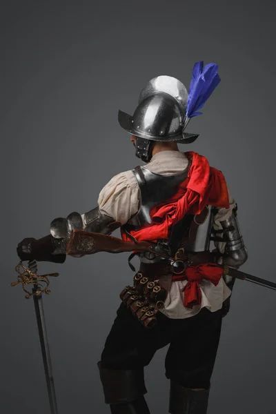 Portrait Conquistador Dressed Plate Armor Posing Sword Looking Away — Stock Photo, Image