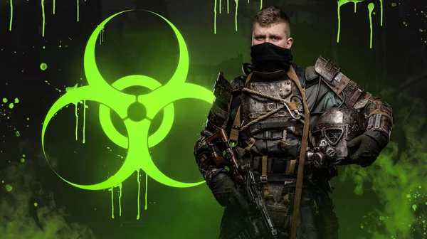 Post-apocalyptic soldier stands surrounded by toxicity, holding a conceptual rifle and unique anti-biological armor designed to protect against the dangers of a biologically toxic wasteland